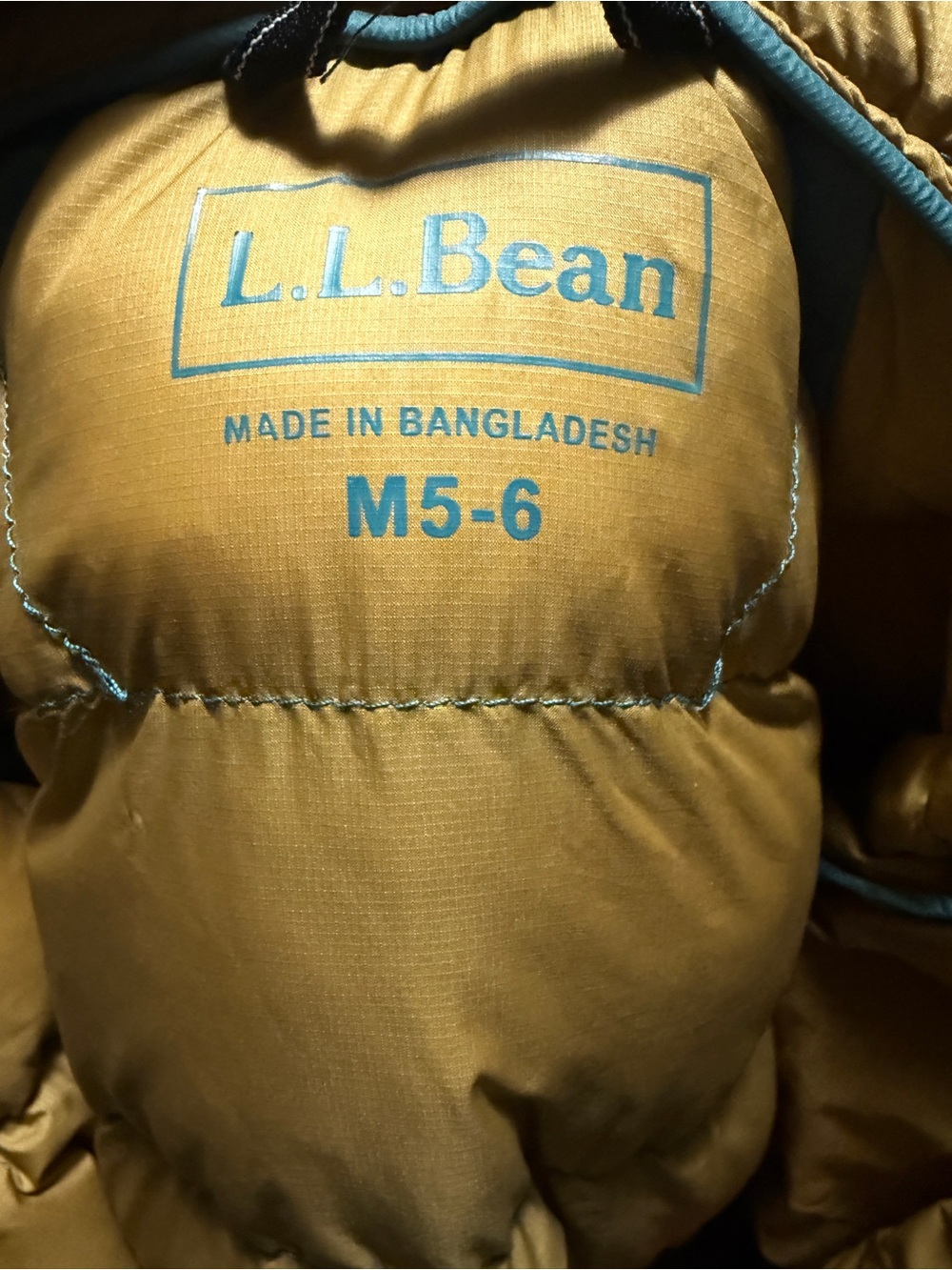 L.L. Bean Kids’ Ultralight 650 Down Puffer Jacket in Storm Teal w Orange Accents - Picture 2 of 3